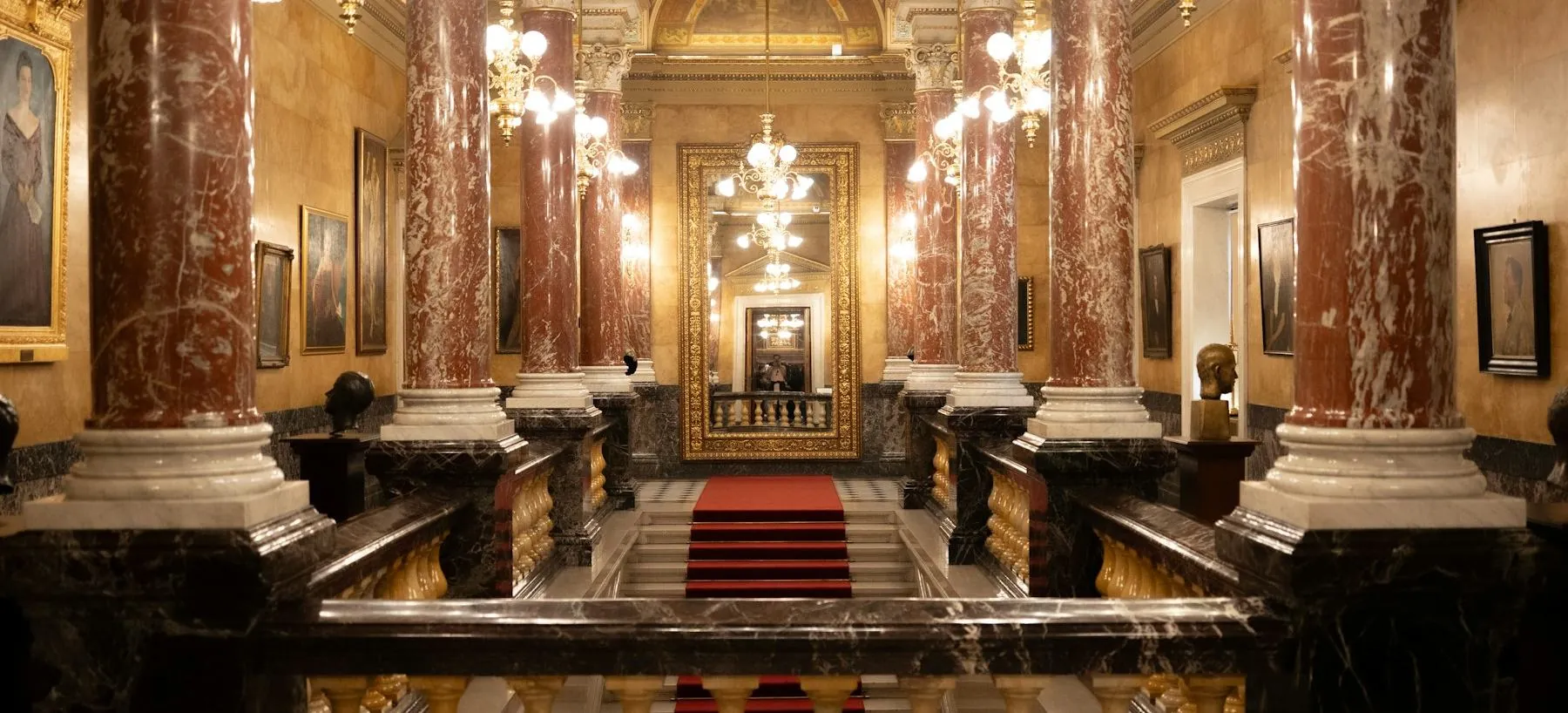A grand hall with marble columns